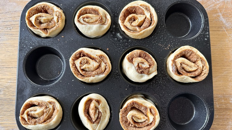 cinnamon buns in muffin tin