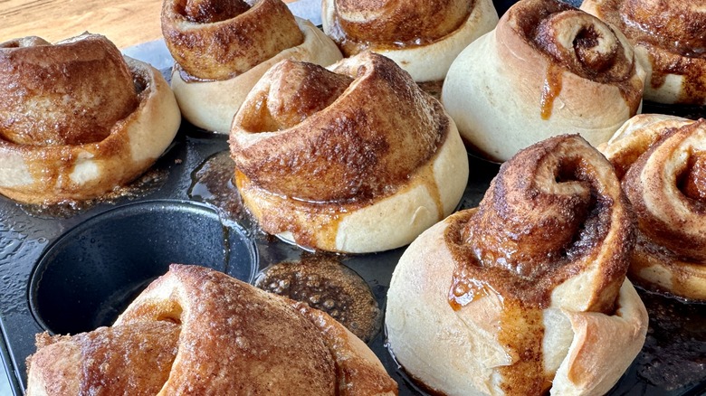 closeup cinnamon buns in tin