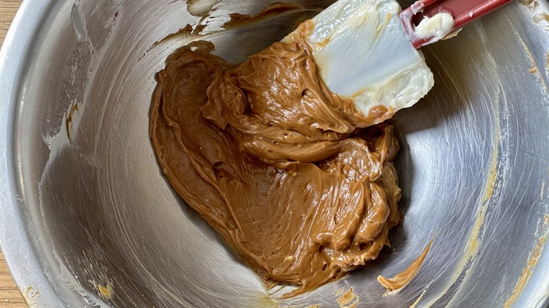 mixing butter molasses in bowl