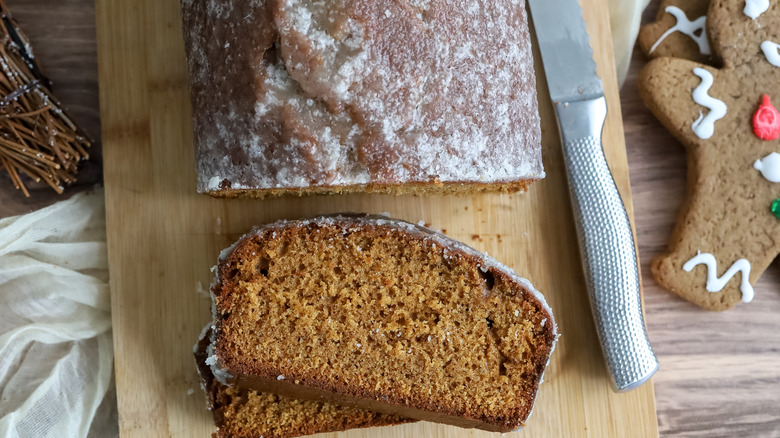 sliced gingerbread pound cake with rum glaze on a cutting board