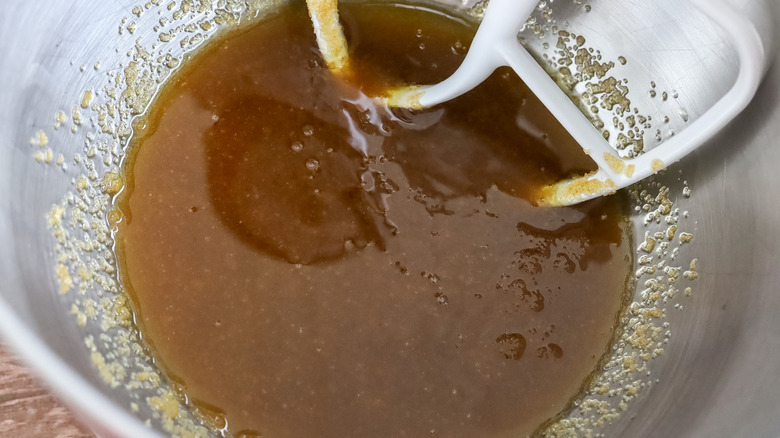 vegetable oil and sugar beaten together in the bowl of a stand mixer