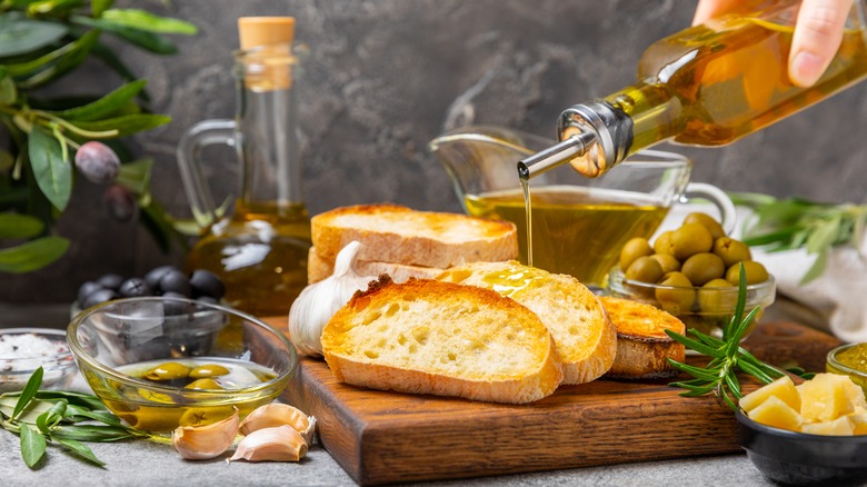 Bread with oil, olives, and cheese