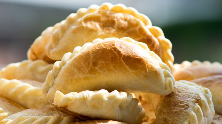 pile of baked empanadas