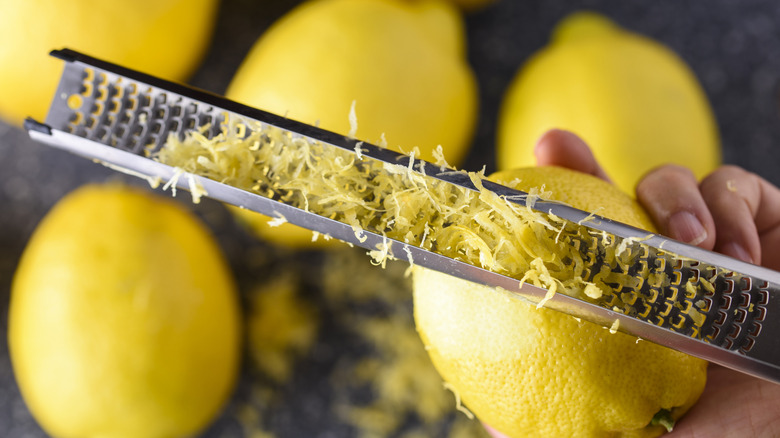 Lemon zest being grated