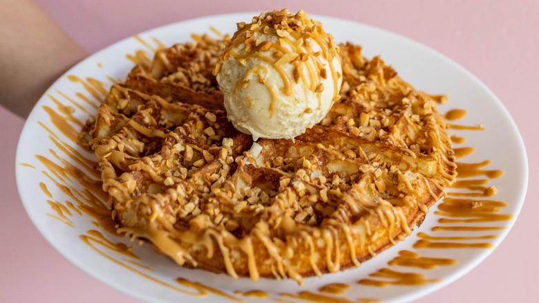 loaded waffle with cookie butter and ice cream scoop