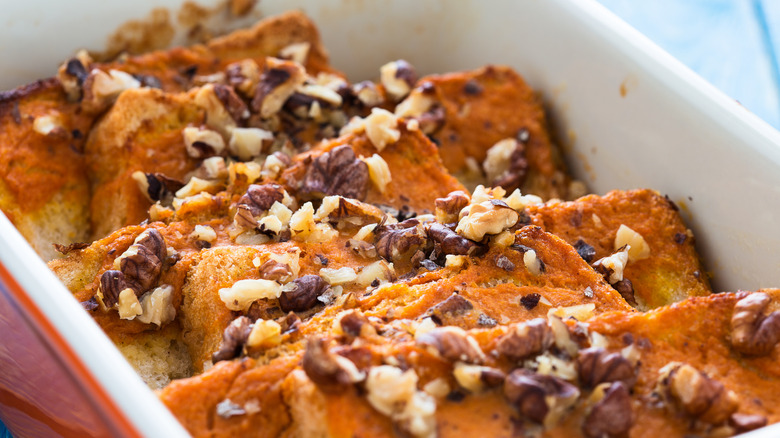 Pumpkin bread pudding topped with nuts