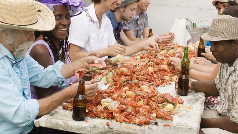 People sharing seafood boil