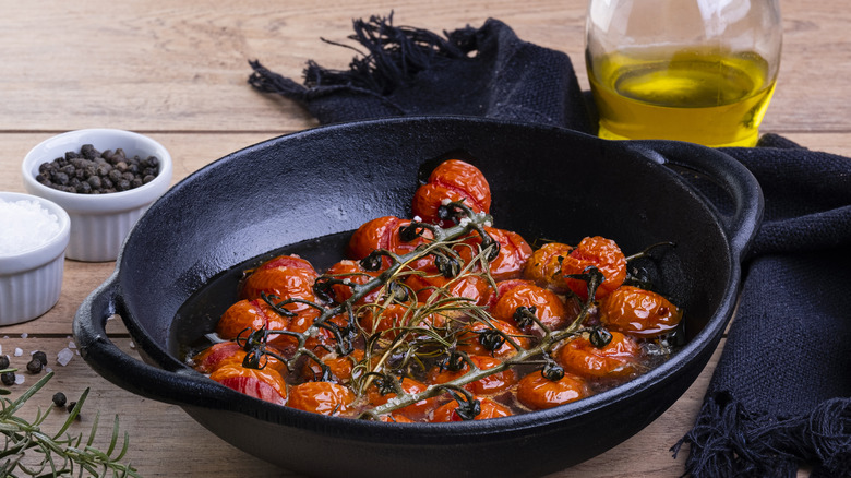 Tomato confit in black pot