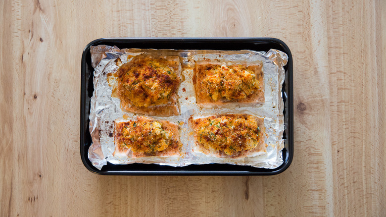 Baked stuffed salmon in pan