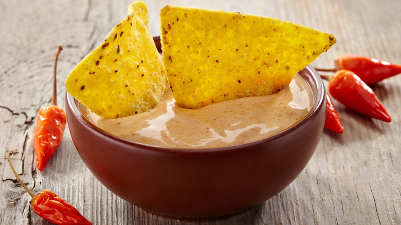 nachos in a chili dip 