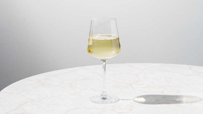 White wine glass on table 