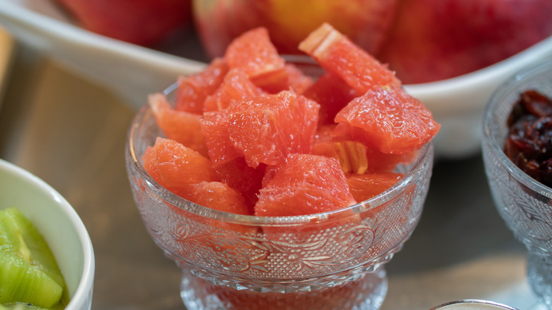 diced grapefruit in glass bowl