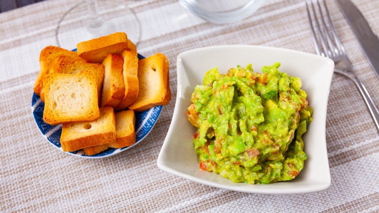 Guacamole and toast pieces