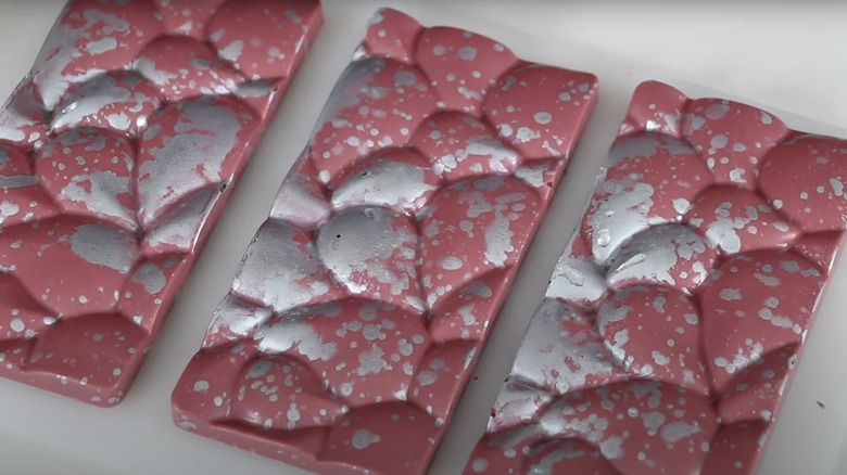 ruby chocolate bars with silver paint splatter