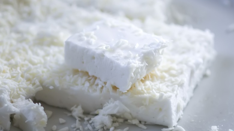 marshmallow covered in grated coconut