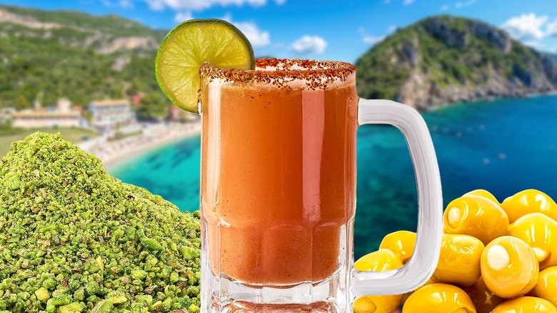 A Michelada cocktail next to olives and oregano with beach background