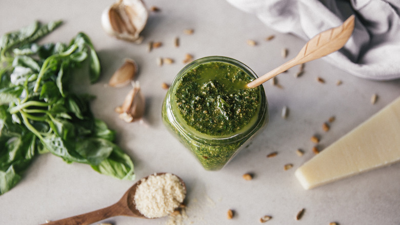 Homemade pesto and ingredients