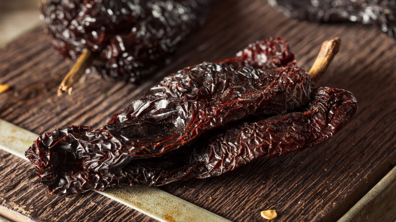 Ancho chiles on cutting board 