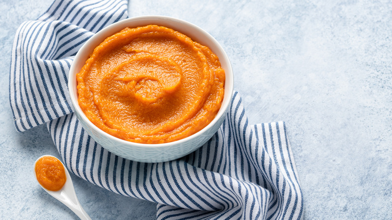 Pumpkin in bowl with towel