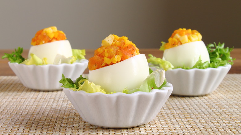 vertical deviled eggs in trays