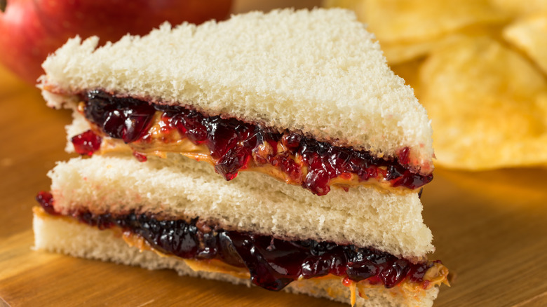 sliced pb&j sandwich on white bread