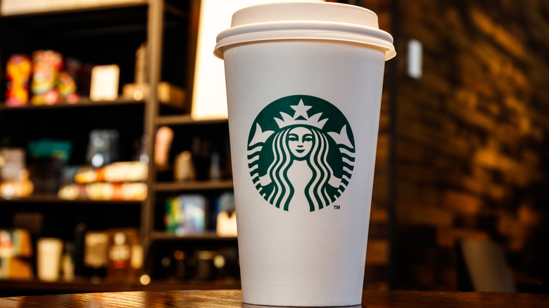 starbucks cup on table