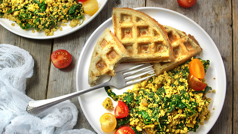 Tofu waffles plated with vegetables