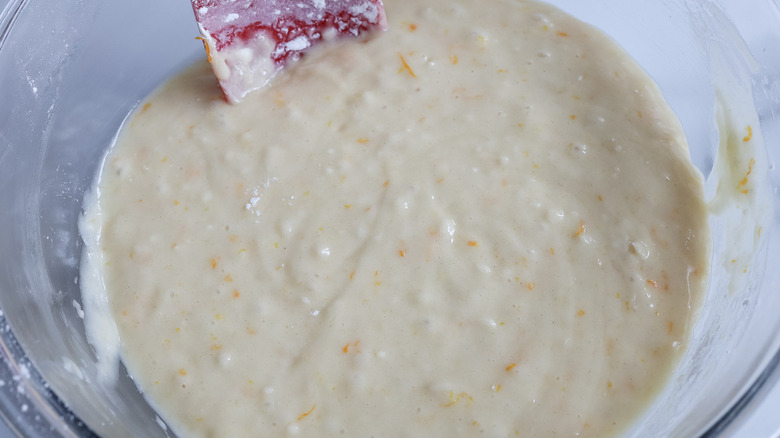 bread batter in bowl with rubber spatula