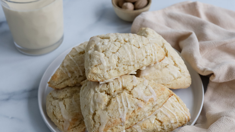 glazed eggnog scones on plate