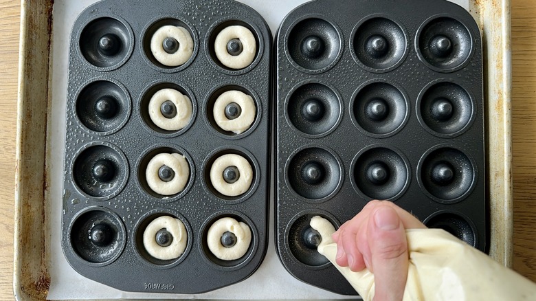 Piping batter into mini donut pans