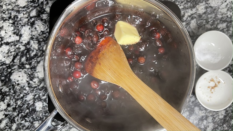 cranberries and butter in pot
