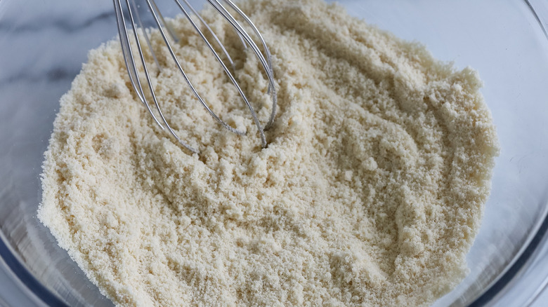 dry ingredients in a bowl with a whisk