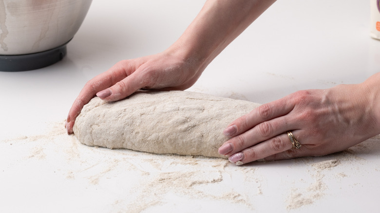 shaping buckwheat bread dough