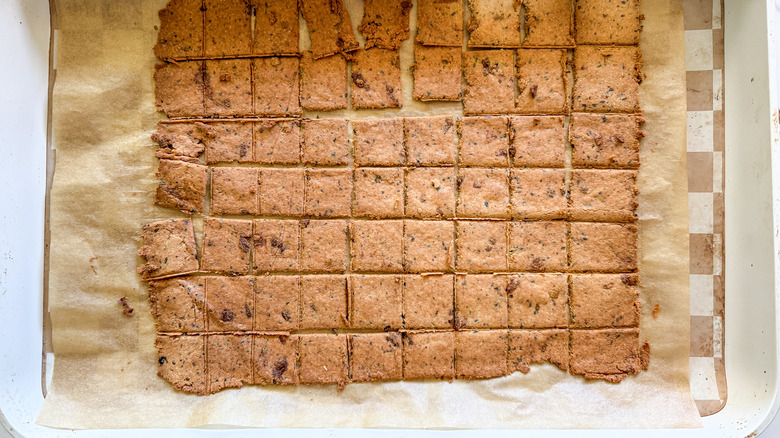 cooked crackers on parchment paper