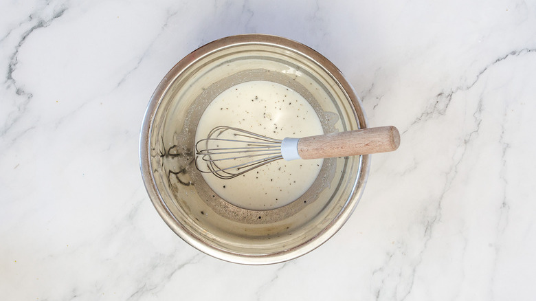 marinade in bowl with whisk