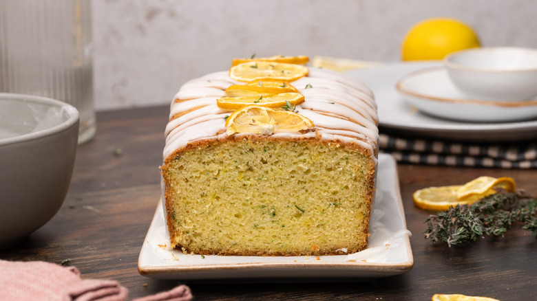 lemon thyme zucchini bread with a slice cut