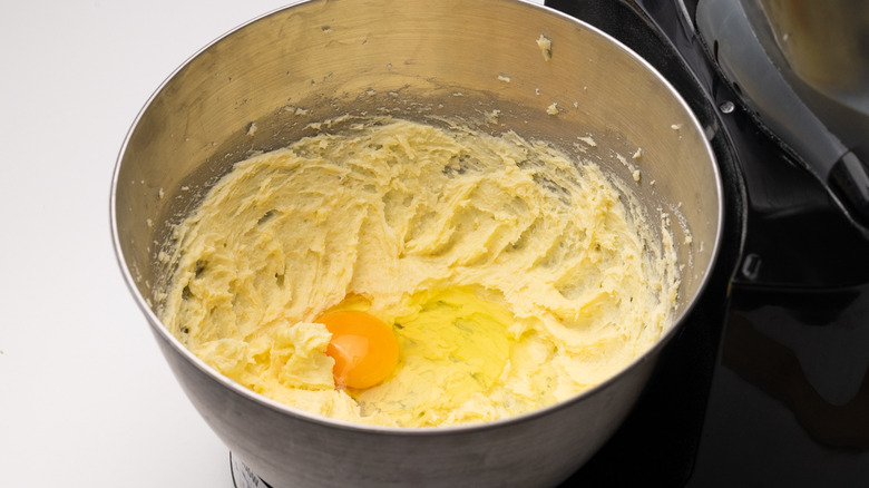 mixing egg into batter