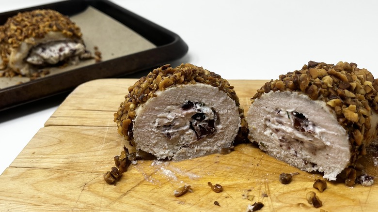 Walnut-crusted cranberry chicken roulade