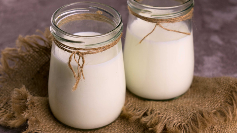 Jars of fresh goat milk