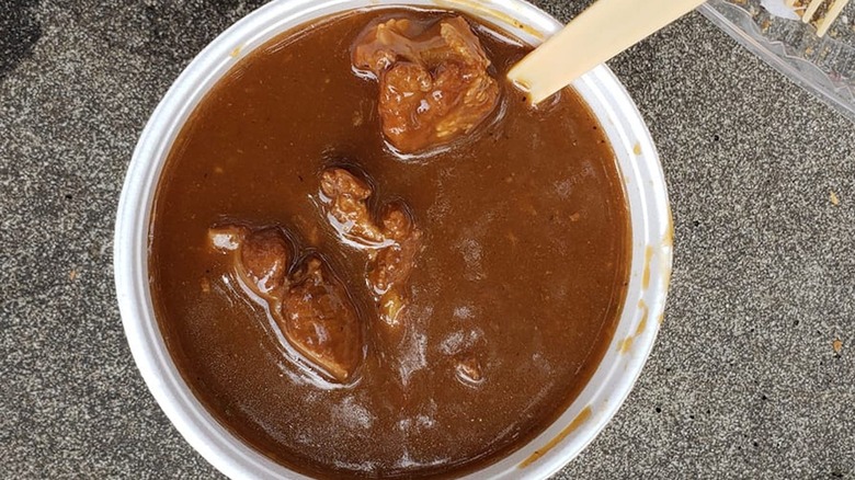 goat water stew in a pan