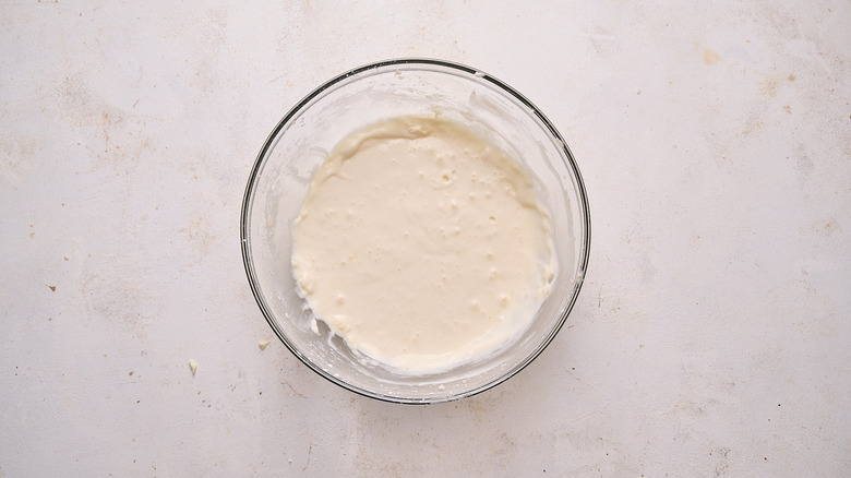 milk beaten into cream cheese