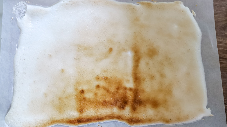 toasted marshmallow cream on parchment paper