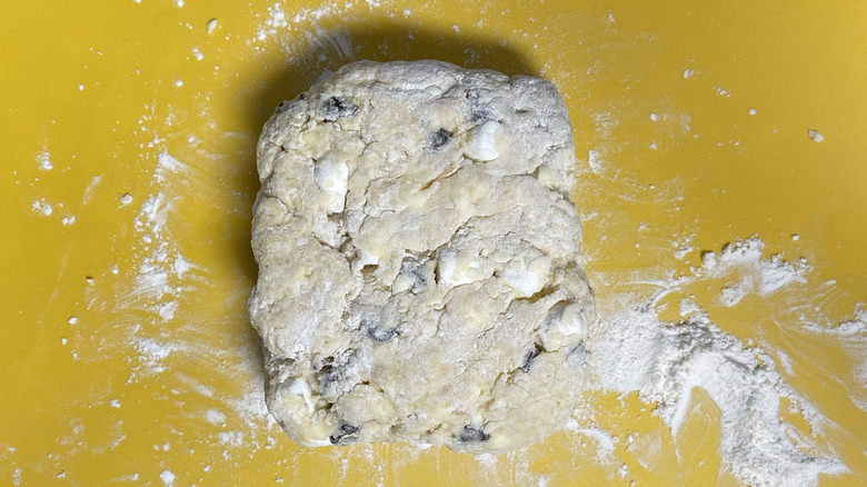 shaping scone dough on surface
