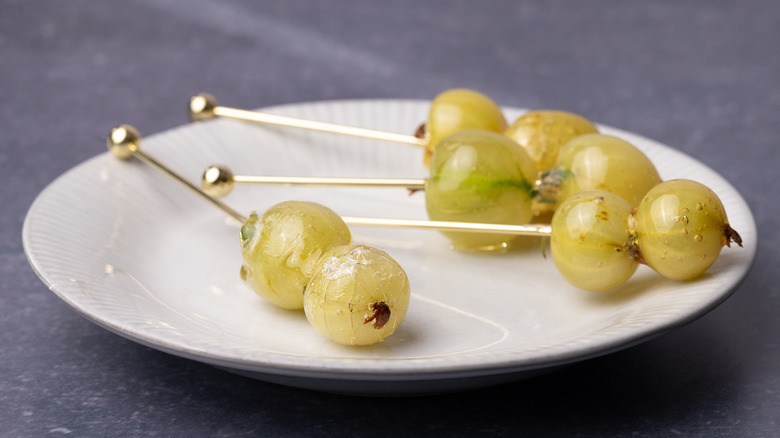 plate with candied gooseberry garnish