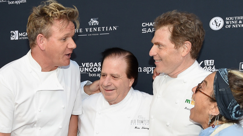 Bobby Flay and Gordon Ramsay talking at event