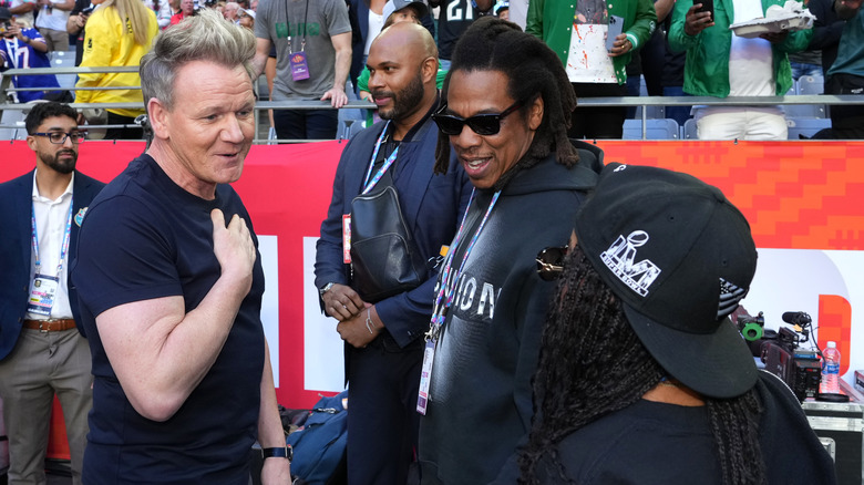 Gordon Ramsay talking with Jay-Z at Super Bowl