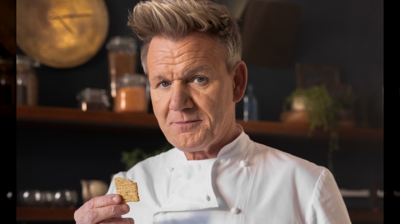 Gordon Ramsay holding a cracker