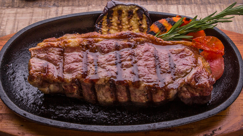 Seared steak with rosemary and grilled vegetables