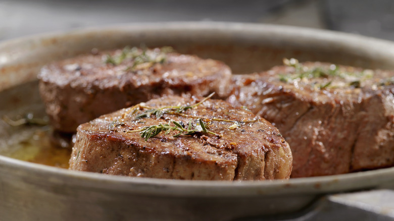 filet mignon steaks in dish