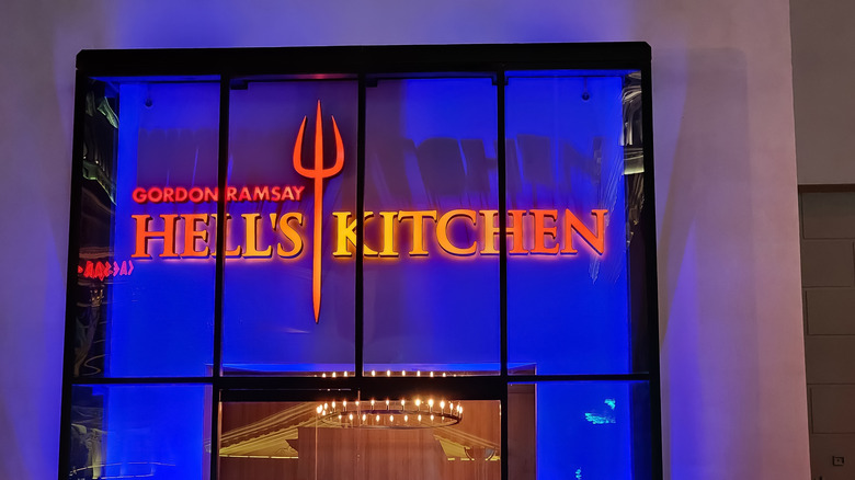 Hell's Kitchen restaurant sign outside of building